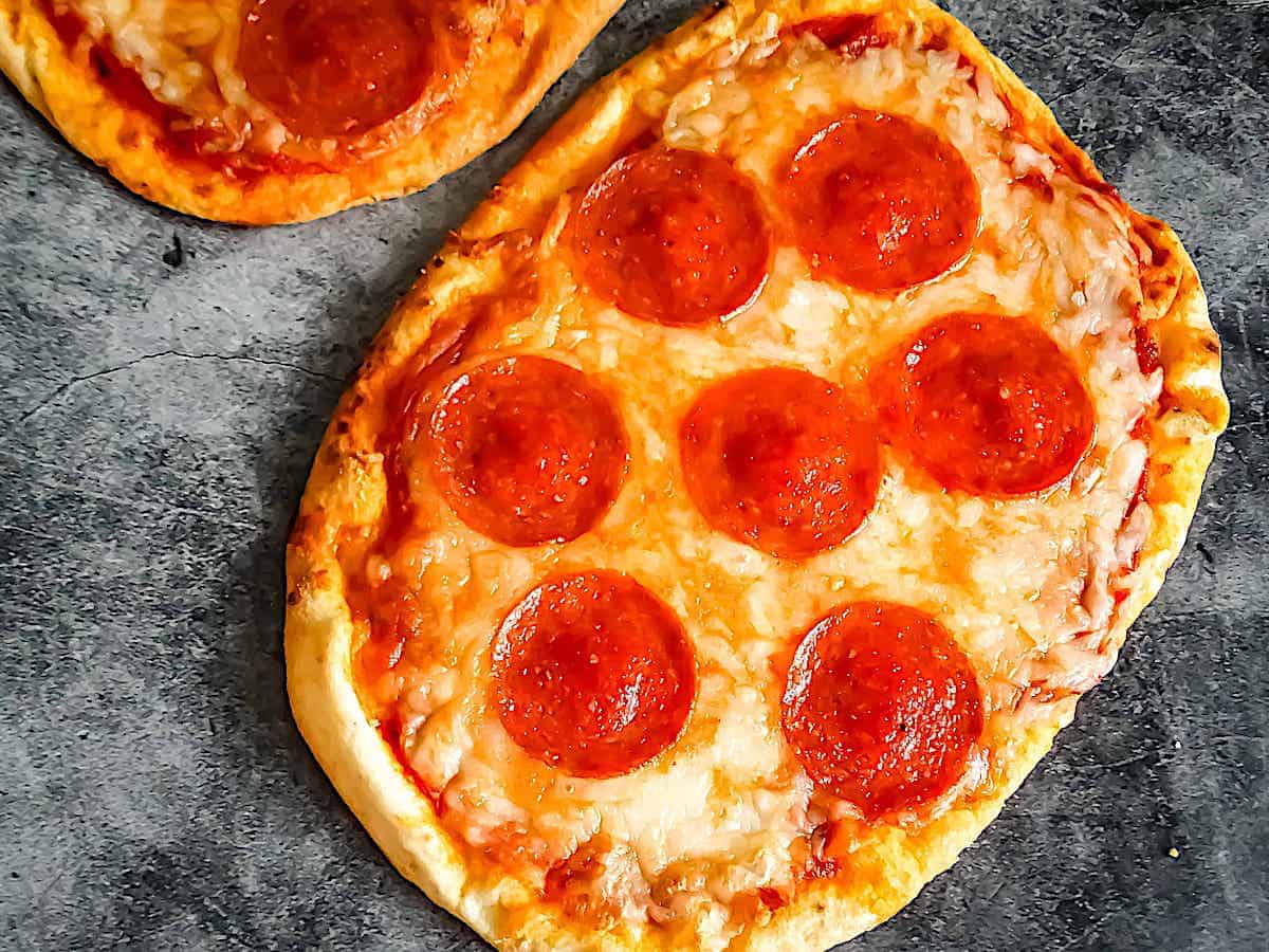pepperoni flatbread pizza on a gray background