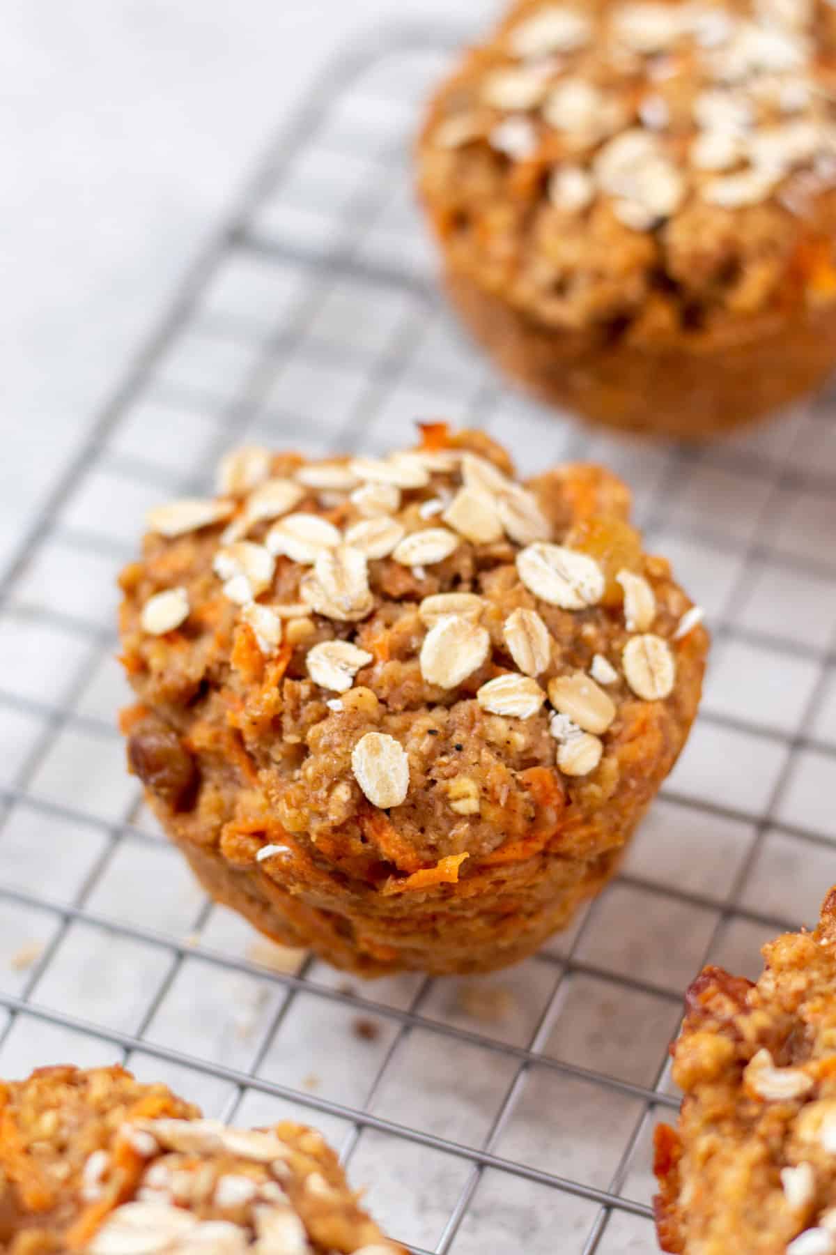healthy carrot muffins on a cooling rack