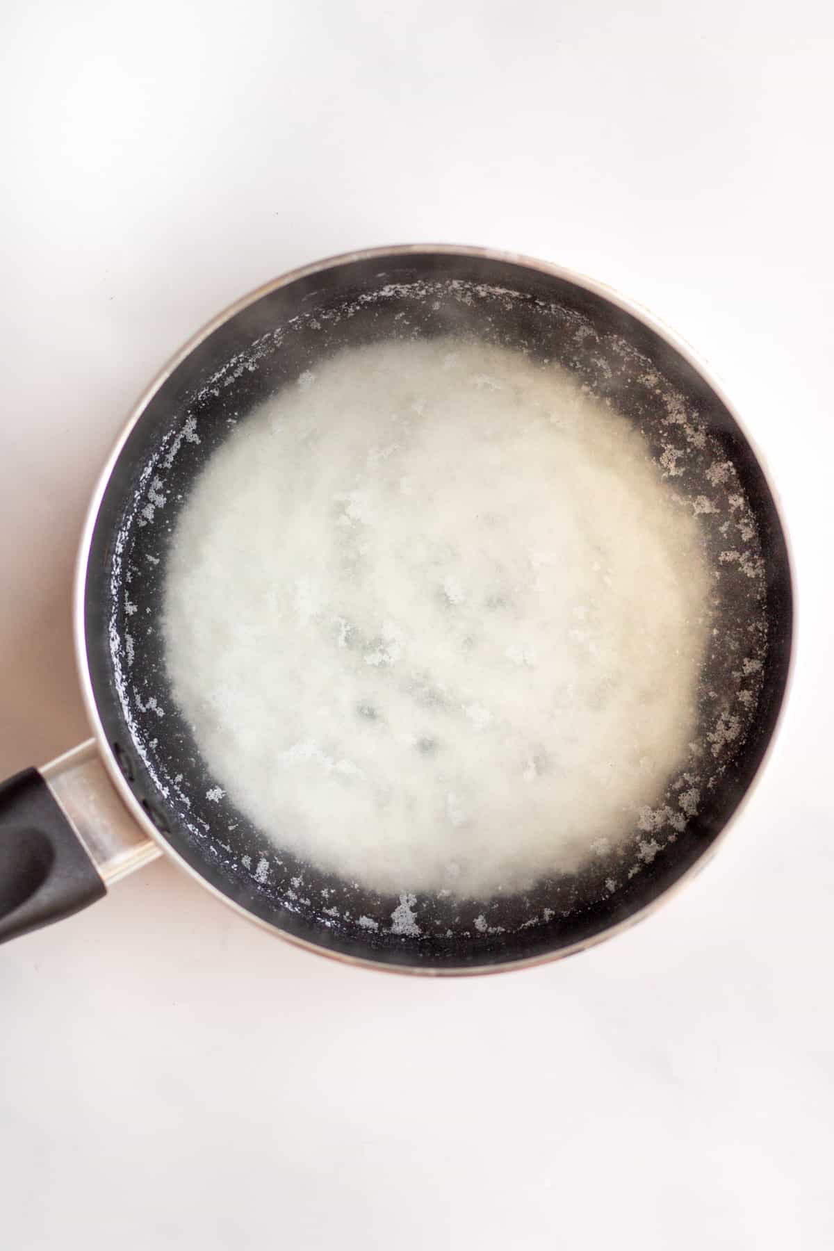 yogurt and water steaming in a pot