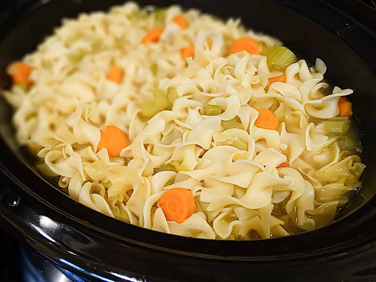 chicken noodle soup in a crockpot