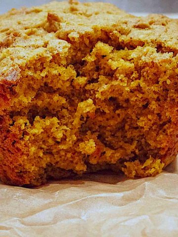 pumpkin spice muffin on parchment paper