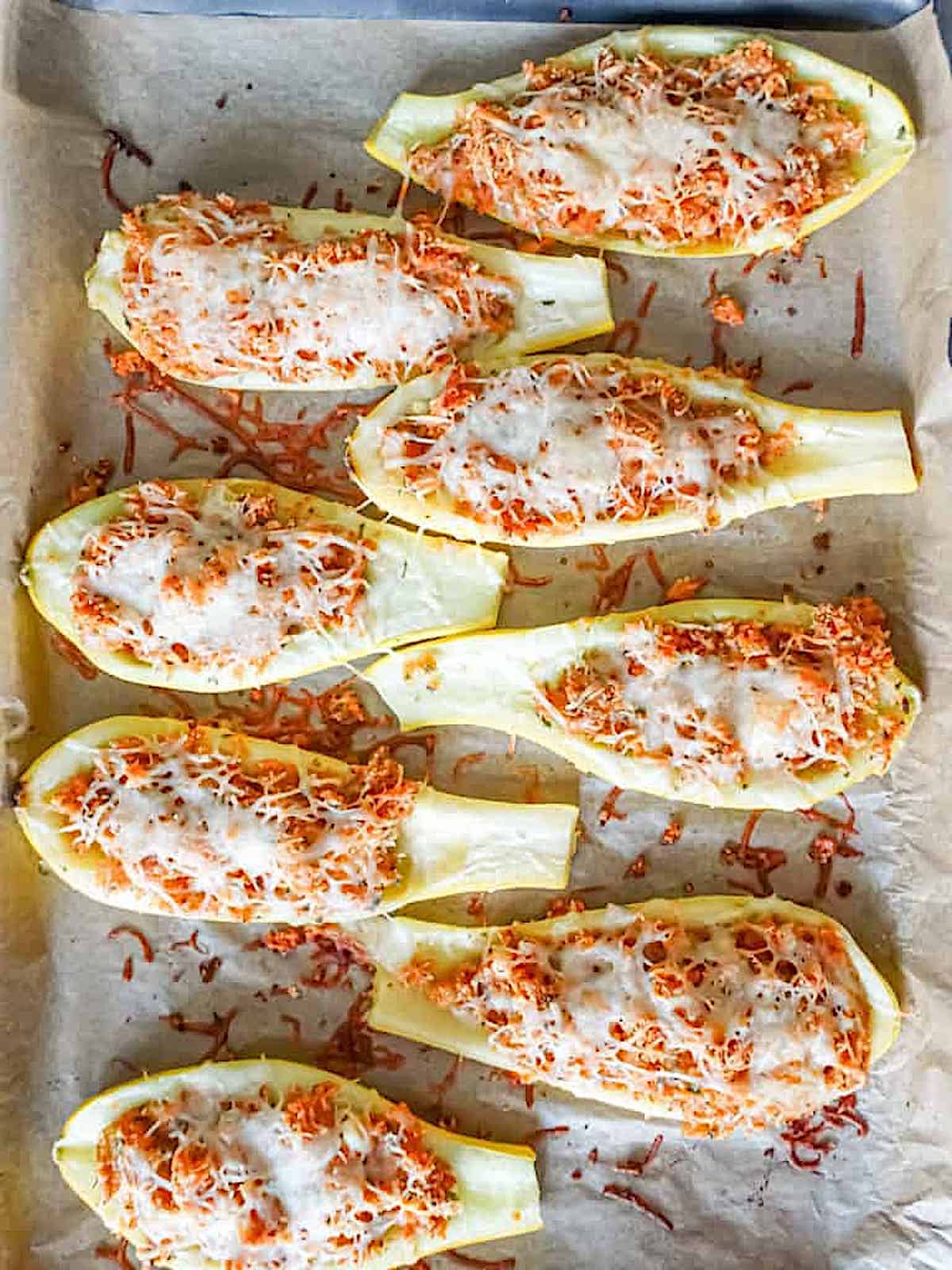 roasted squash boats on a baking sheet