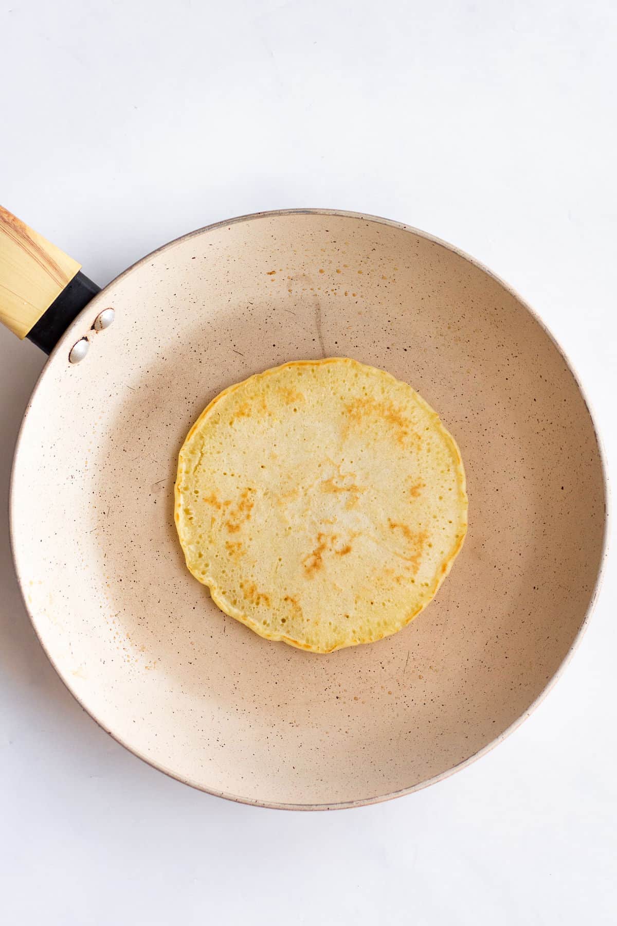 pancake fried on a griddle pan