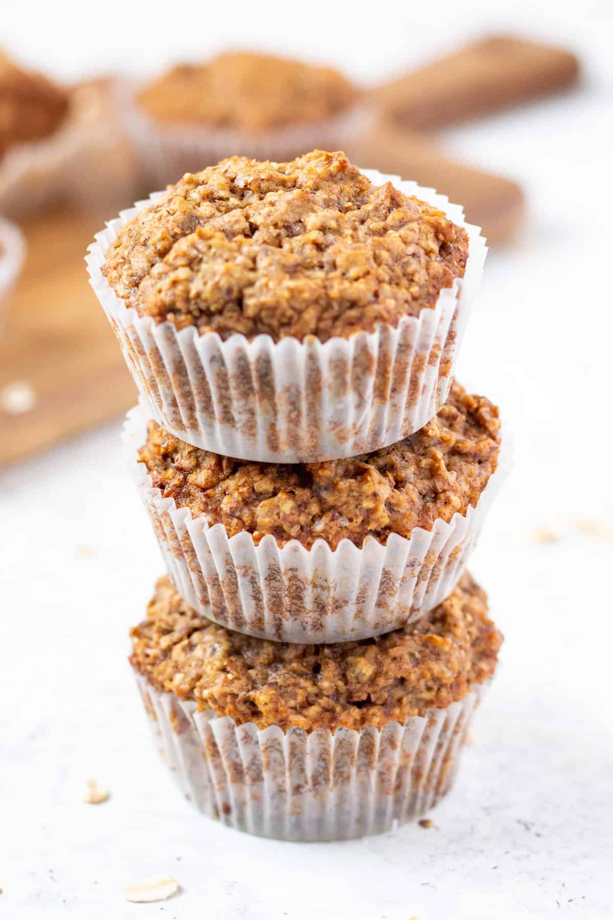 flaxseed muffins in a stack of 3