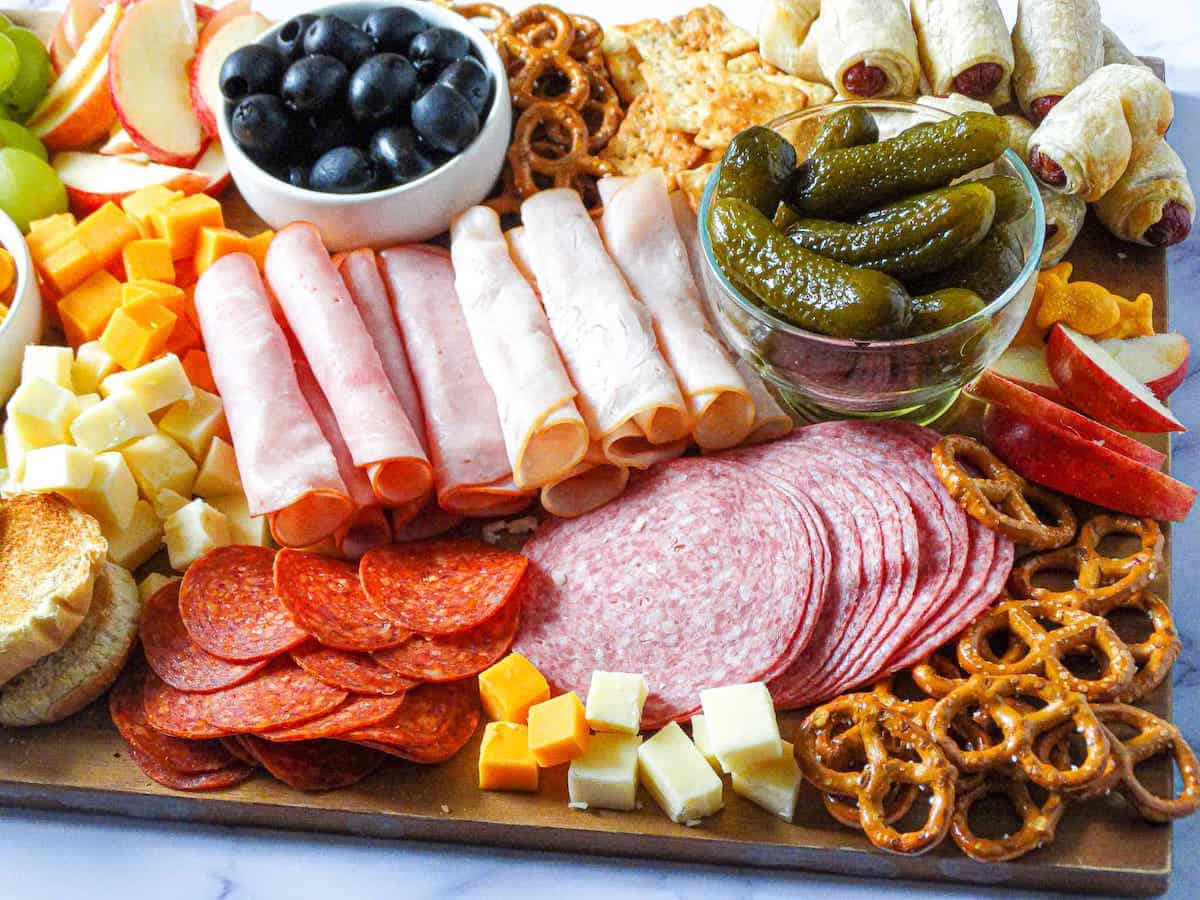 meat and cheese filled kid-friendly charcuterie board