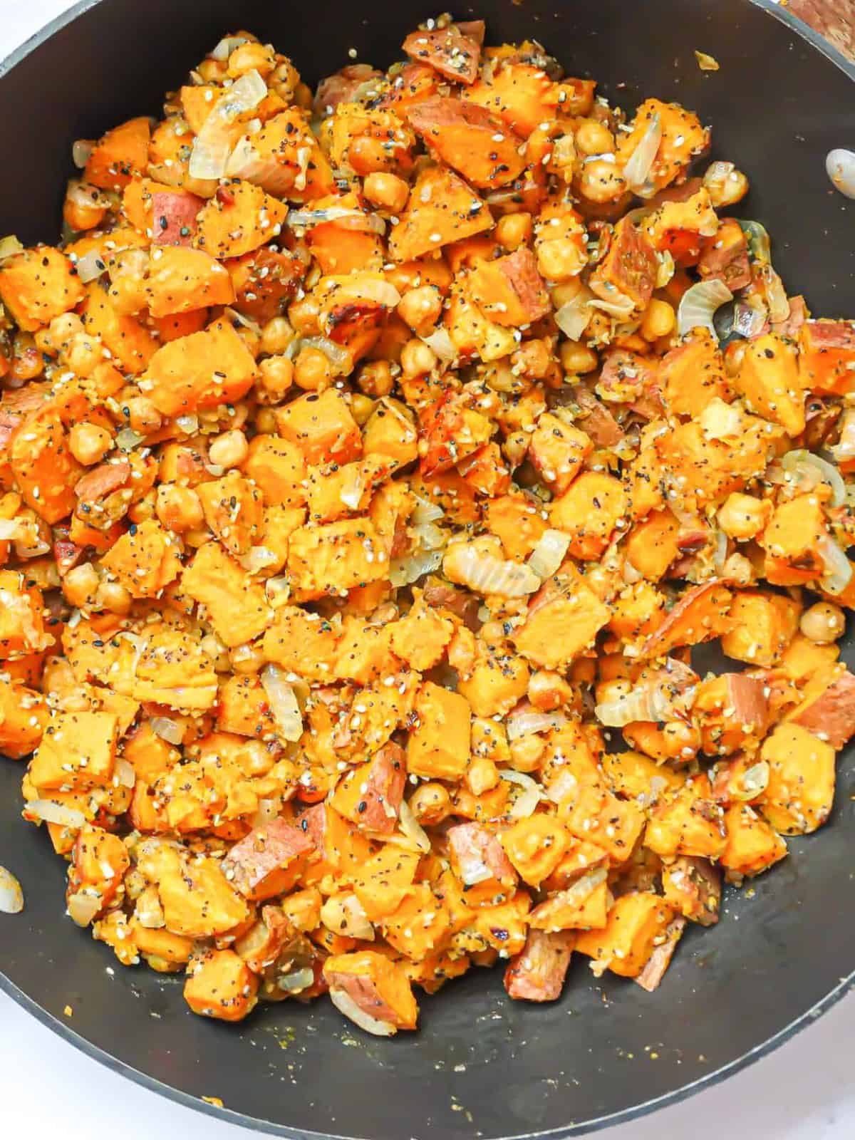 diced sweet potatoes in a wok