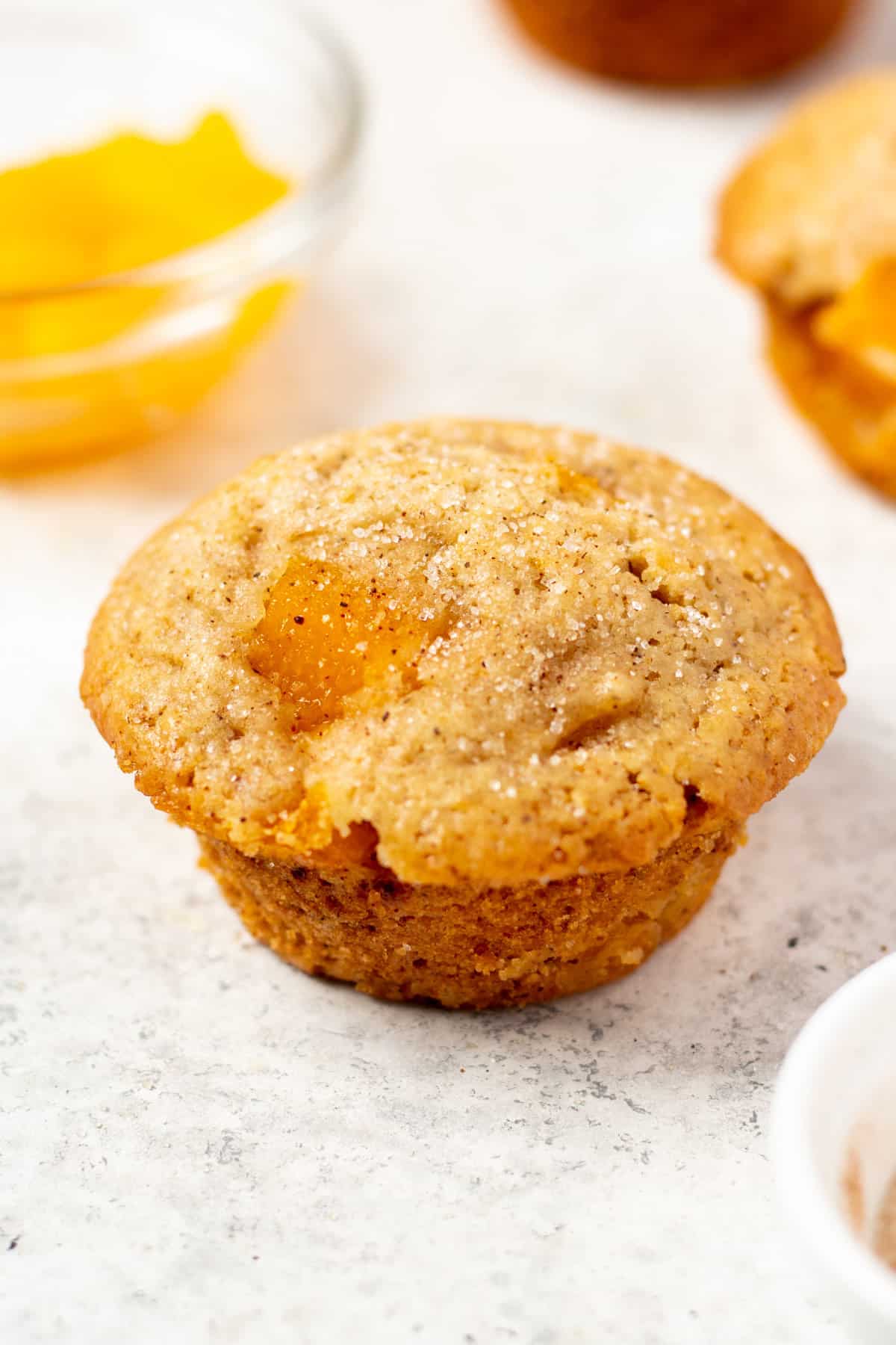 peach muffin on a white table