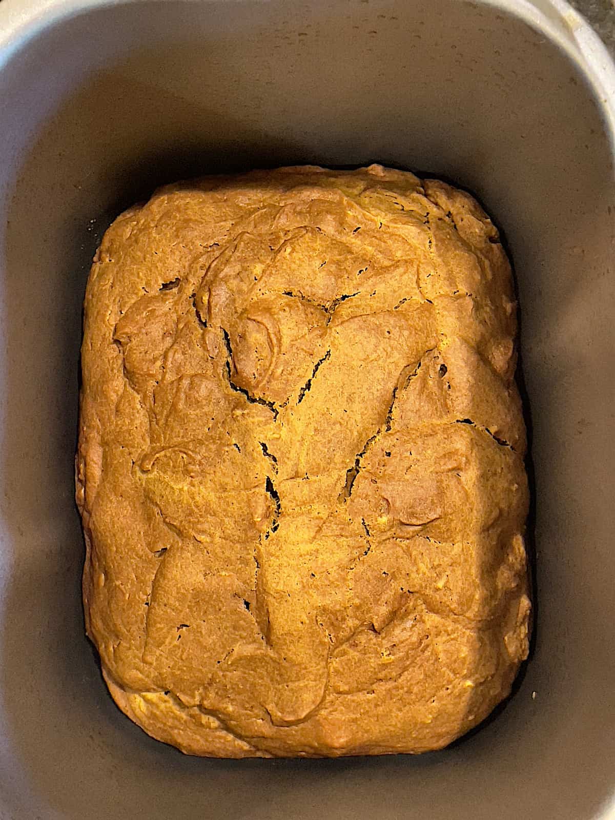pumpkin bread in a bread machine cooked and cooling