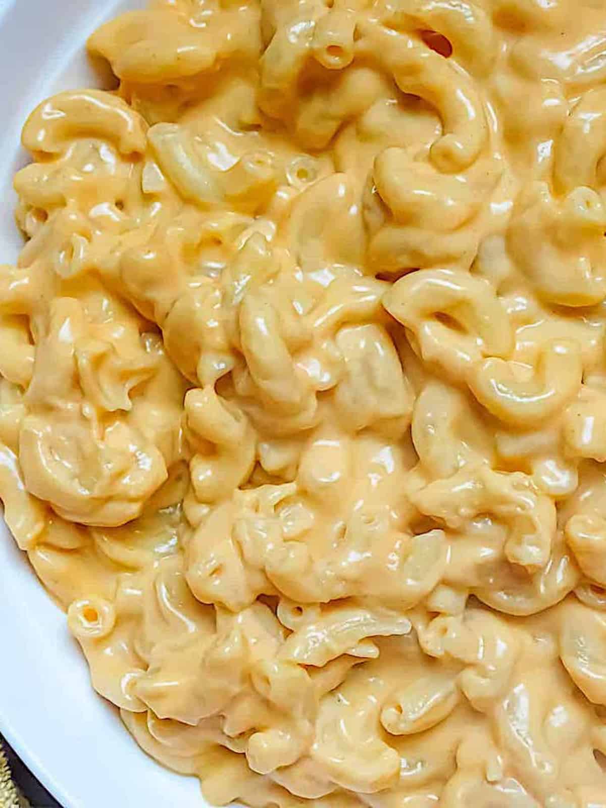 instant pot cauliflower mac and cheese in a white plate
