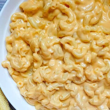 instant pot cauliflower mac and cheese in a white bowl