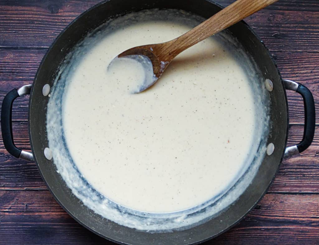 creamy white sauce for pasta in a wok
