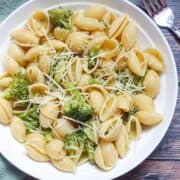 garlic pasta with broccoli in a white bowl