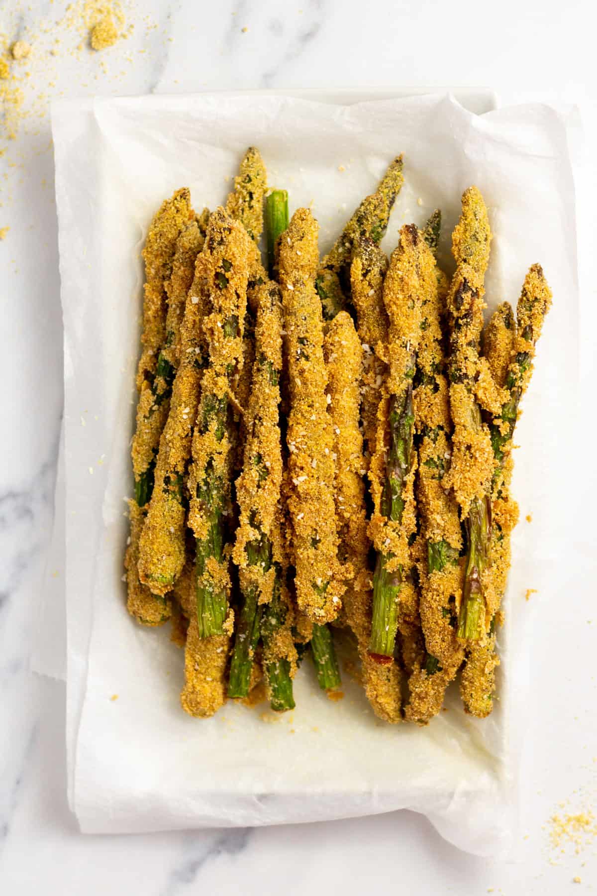 a plate of fried asparagus 