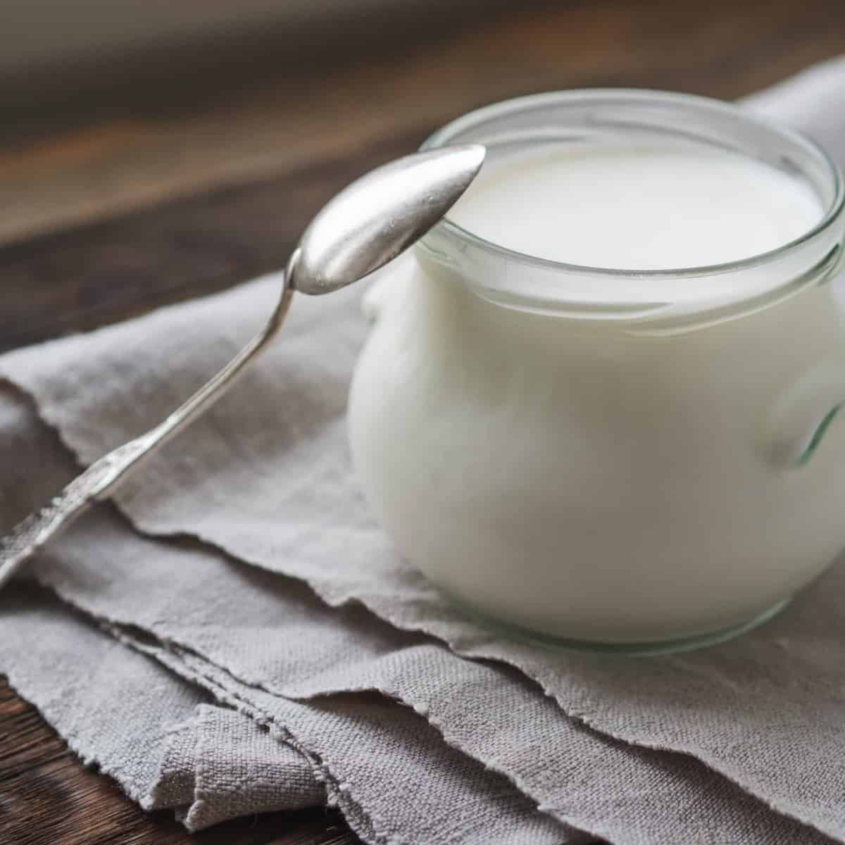 homemade buttermilk in a white jar