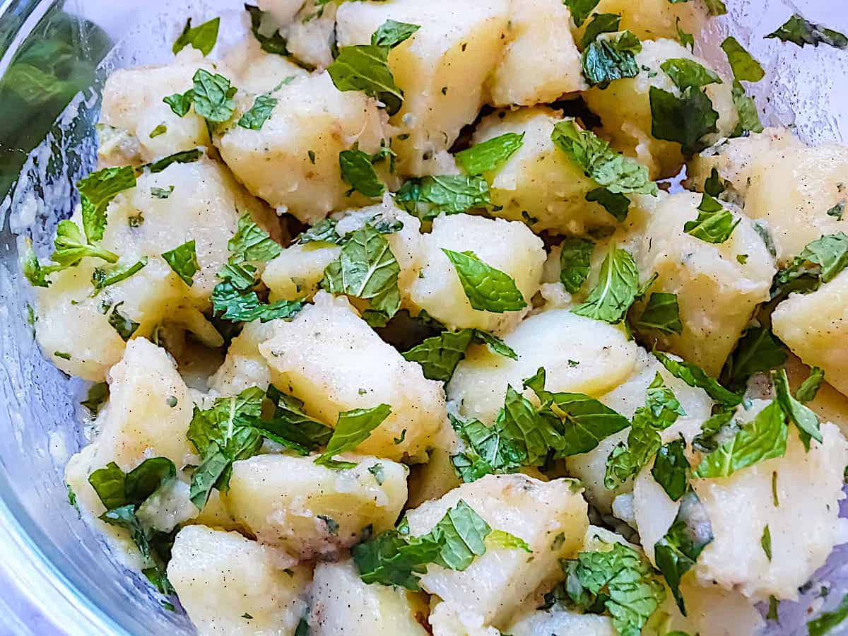 potatoes mixed with lemon, mint and parsley