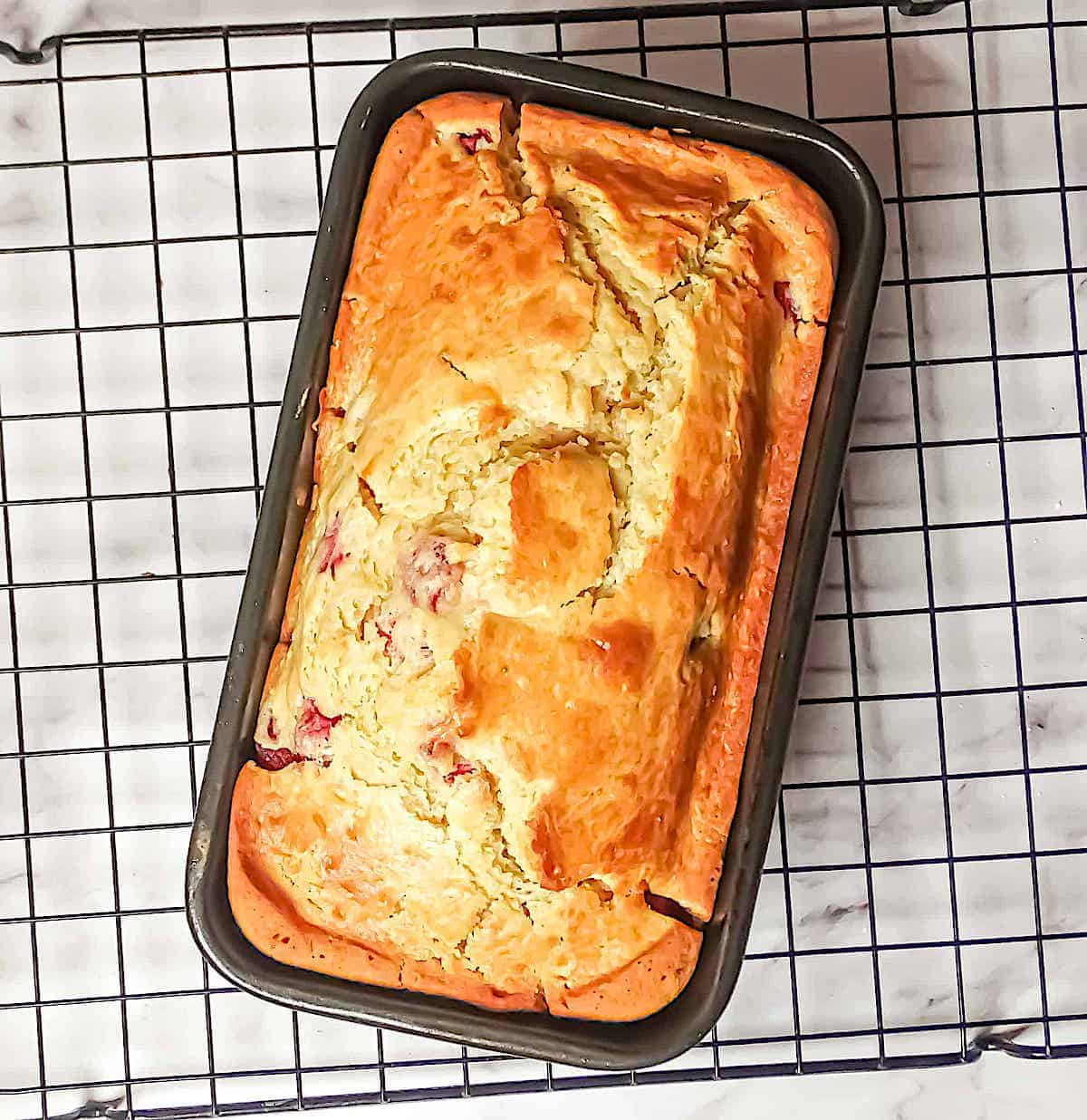 strawberry lemon bread in a loaf pan