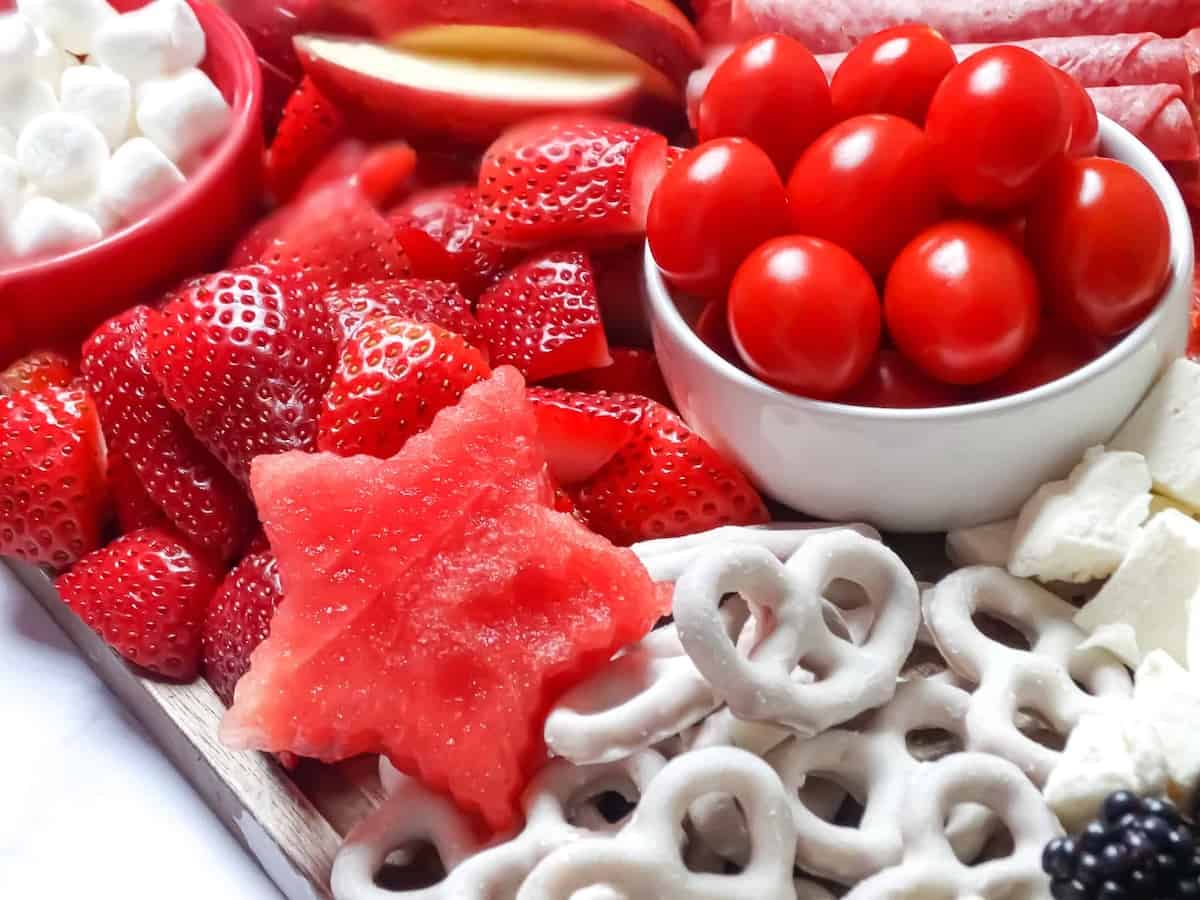 red foods on a patriotic charcuterie board