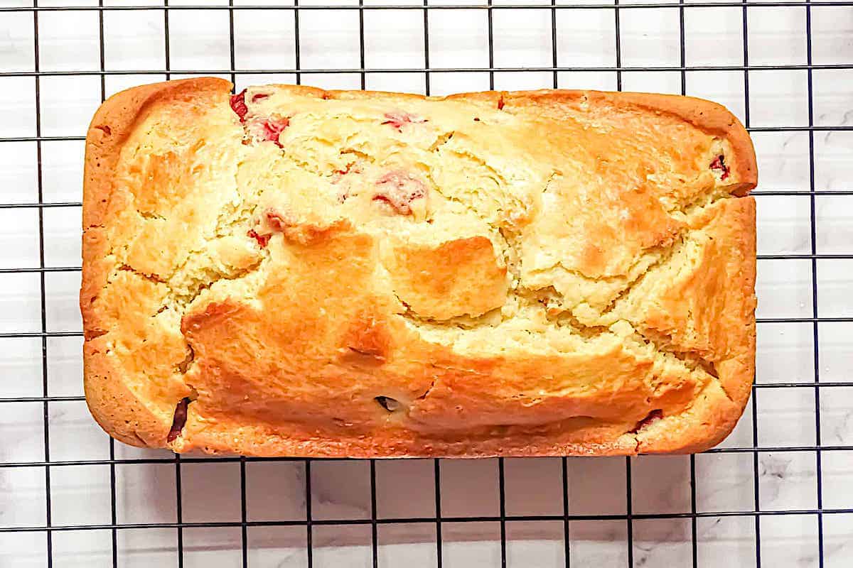 strawberry lemon bread on a cooling rack