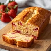 strawberry lemonade bread sliced on a cutting board
