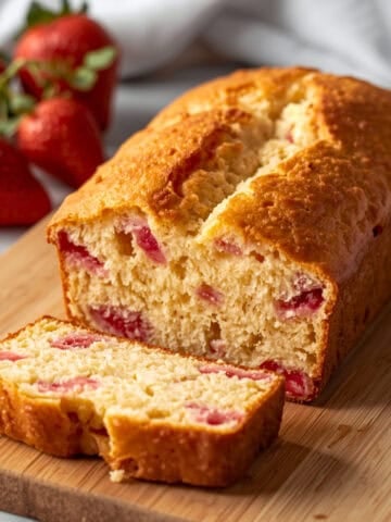 strawberry lemonade bread sliced on a cutting board