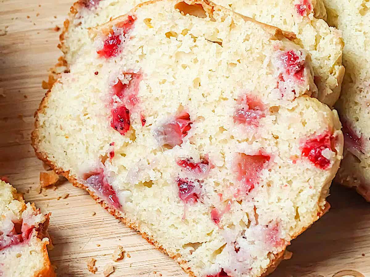 close up of 1 slice of strawberry bread
