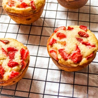 the best strawberry banana muffins on a wire rack