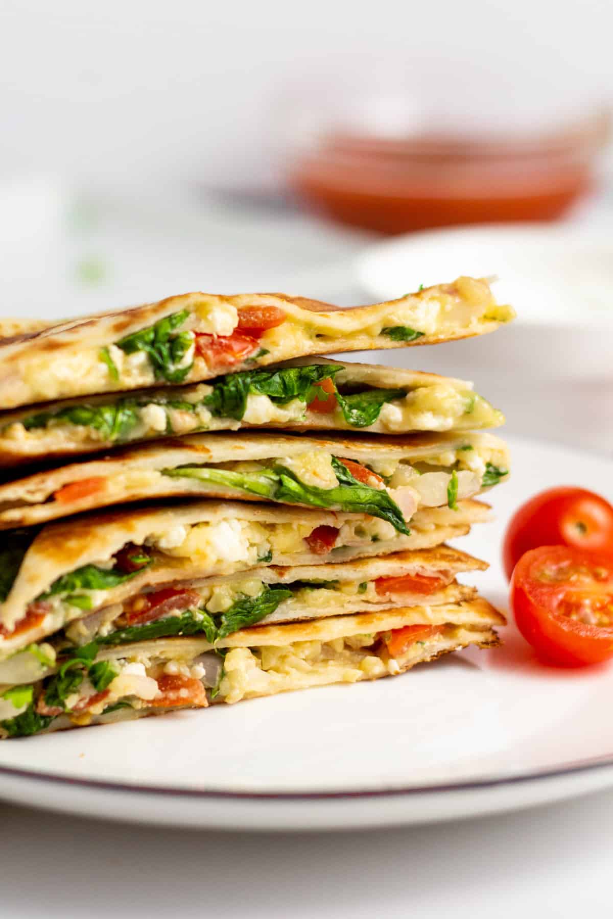 mediterranean quesadilla stacked on a plate