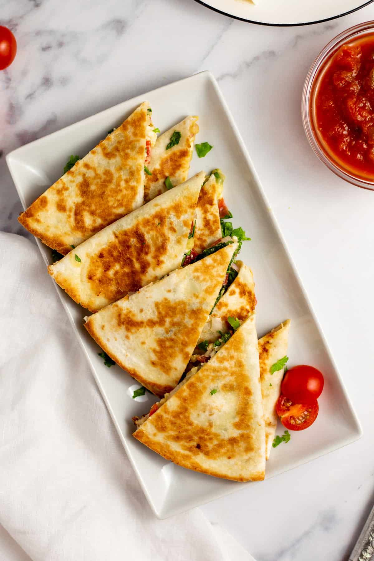 mediterranean quesadillas on a rectangle plate