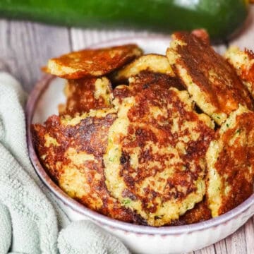 zucchini fritters in a bowl
