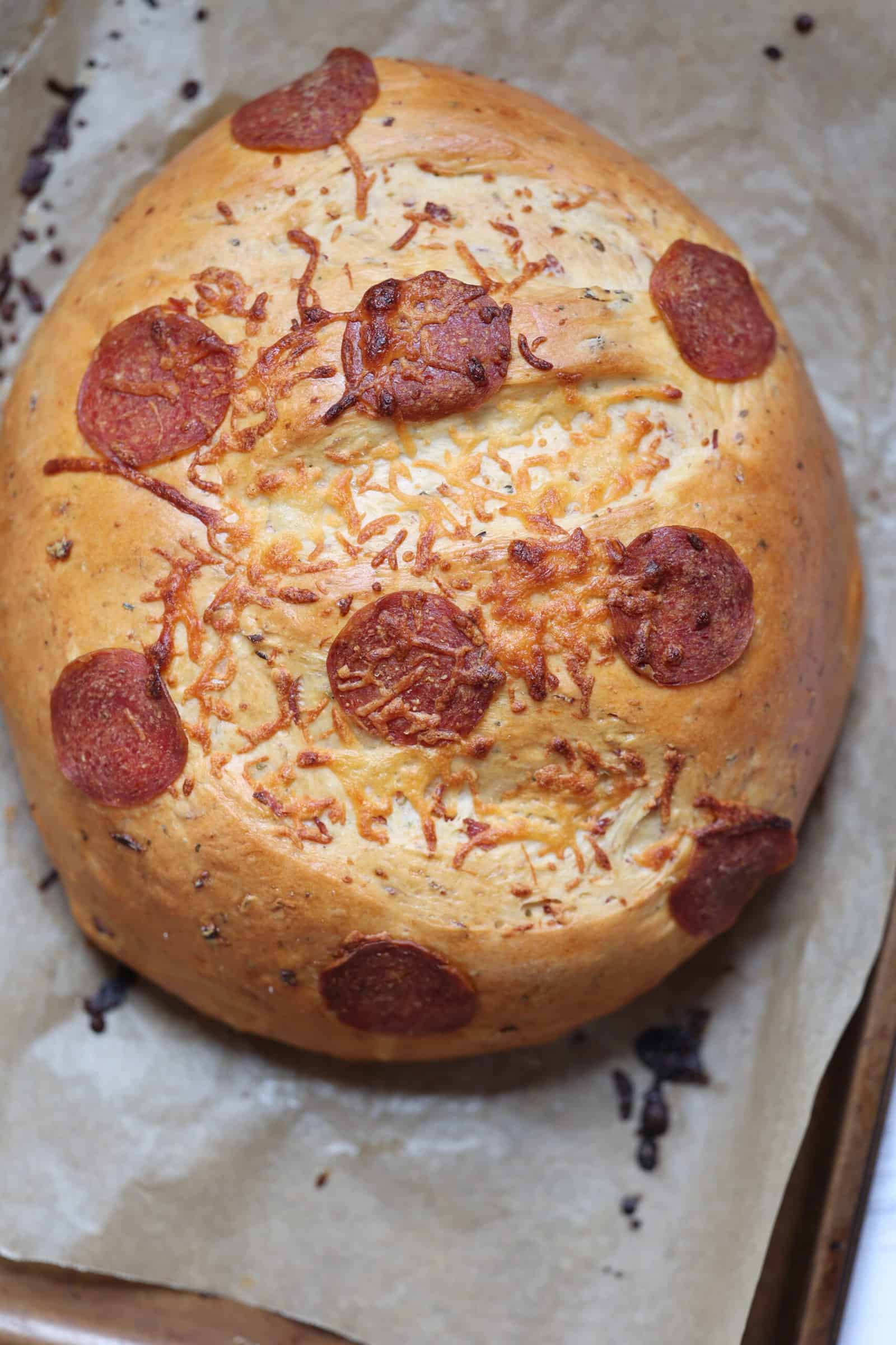pepperoni bread loaf on a baking sheet