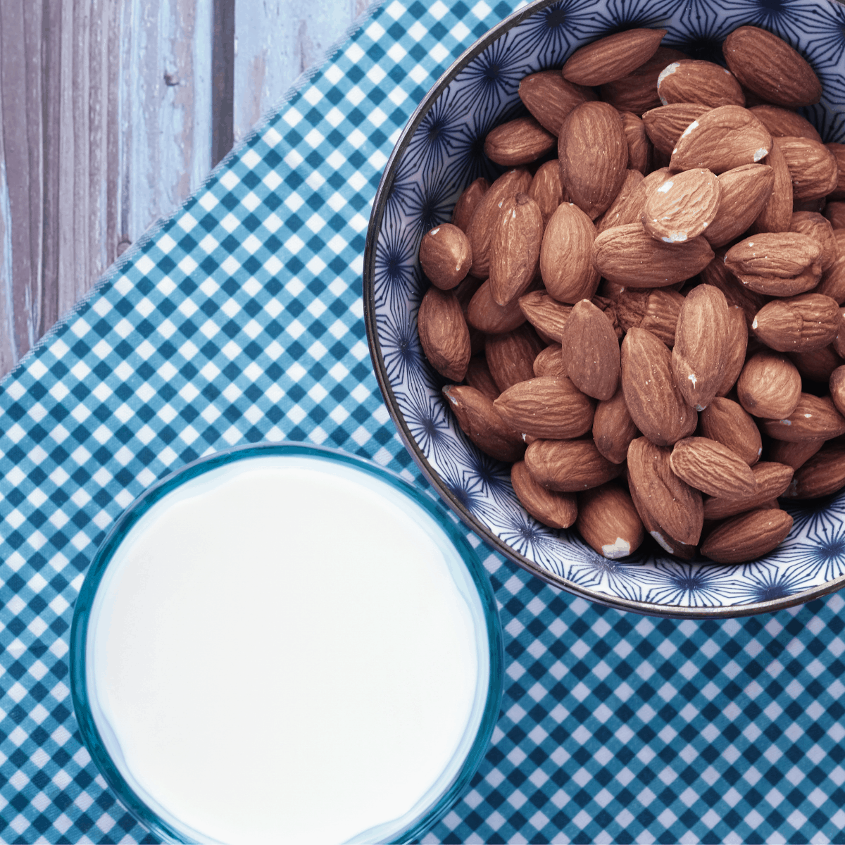 almond milk substitute with almonds in a cup