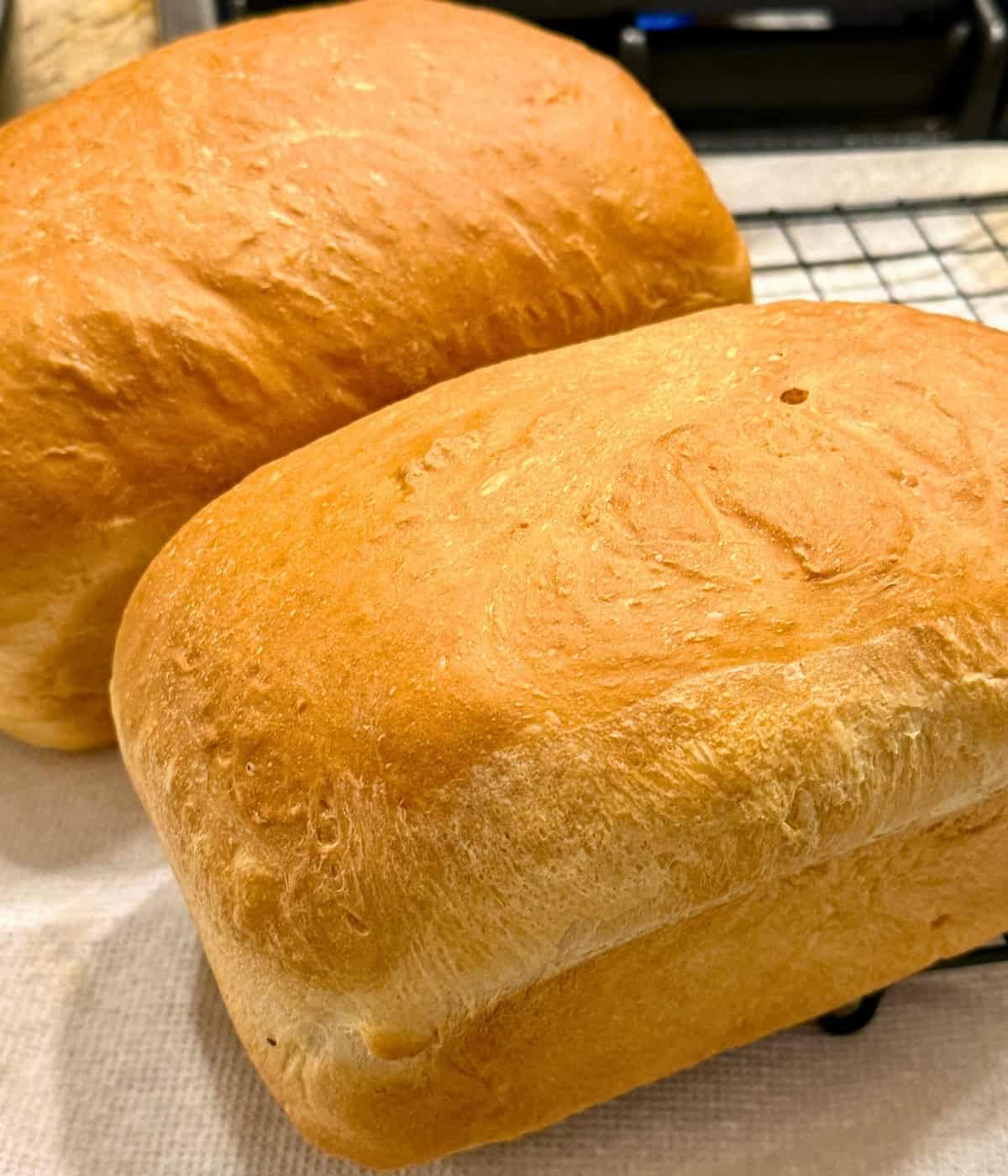 garlic bread loaves on a wire rack