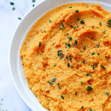 mashed sweet potatoes in a white bowl