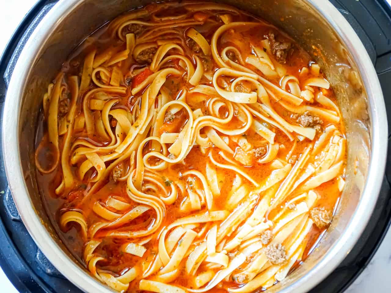 cooked fettuccine in tomato sauce in the instant pot