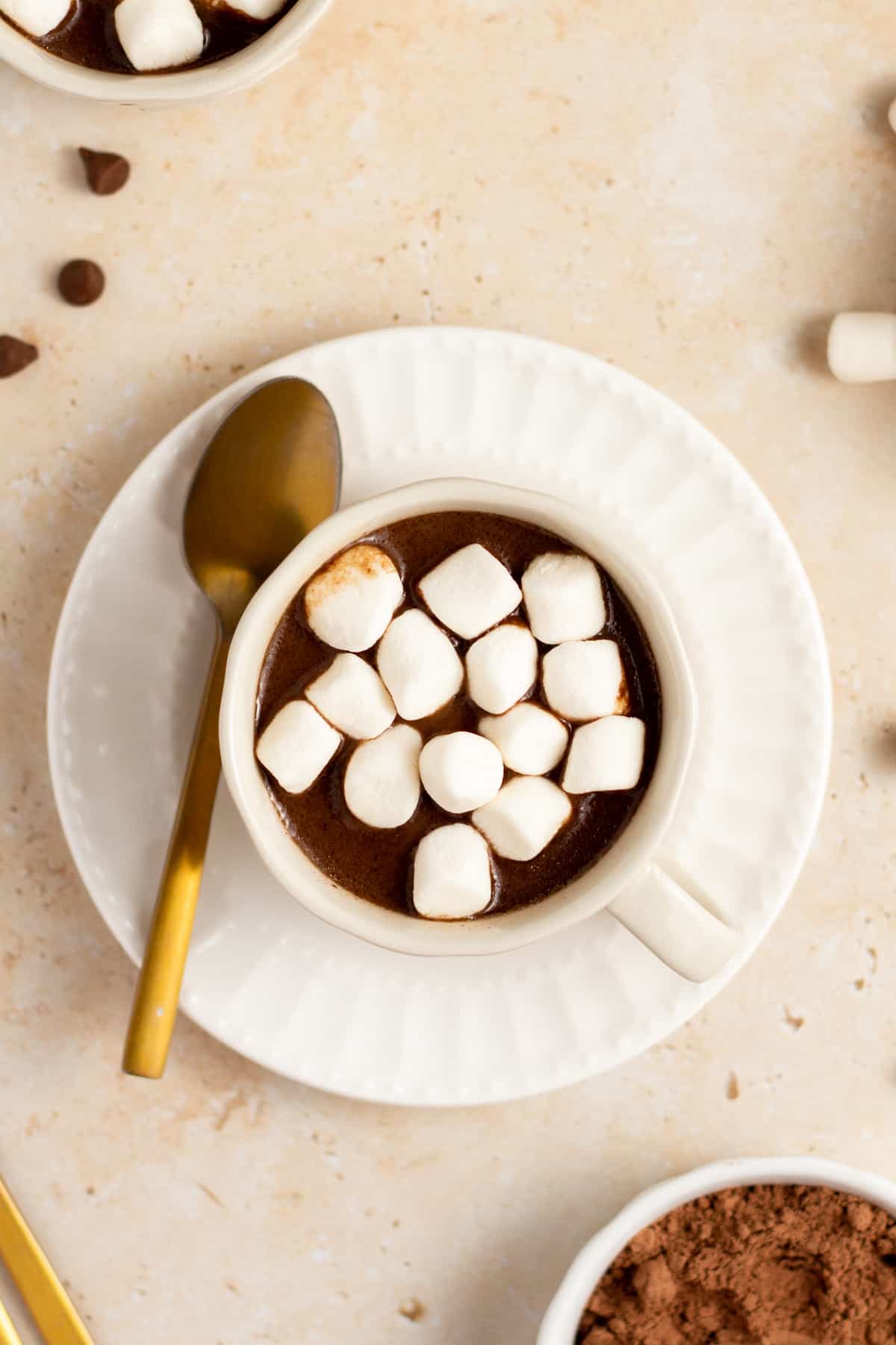 slow cooker hot cocoa in a cup with marshmallows