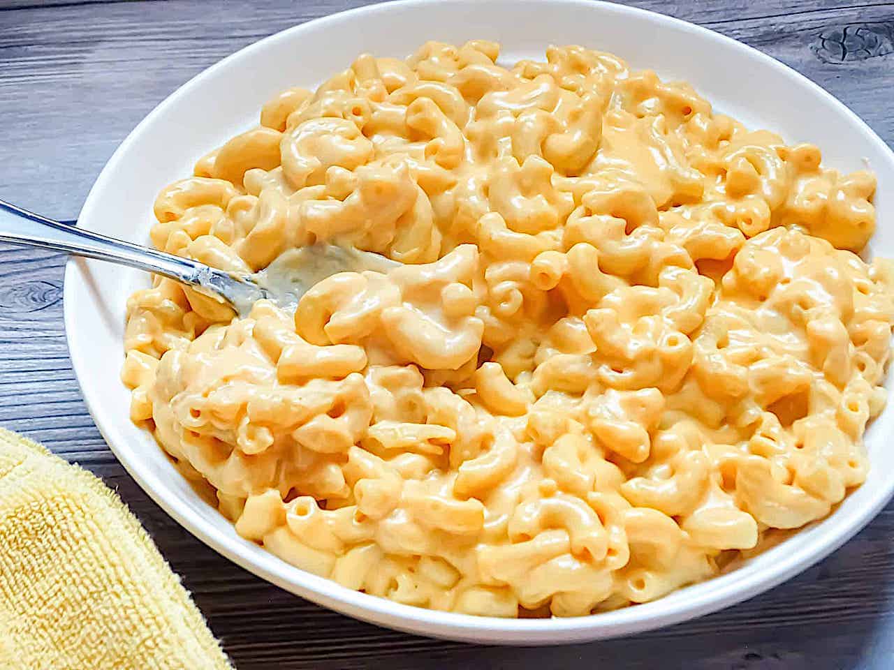 homemade creamy mac and cheese in a white bowl