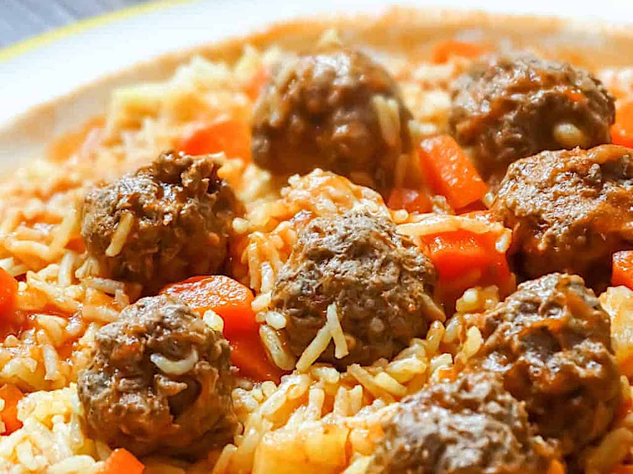 Syrian Kebab Hindi with lamb meatballs, potatoes, carrots, and basmati rice