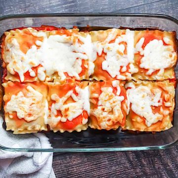 lasagna roll ups cooked and in a glass pan