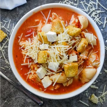 slow cooker chicken parmesan soup in a bowl