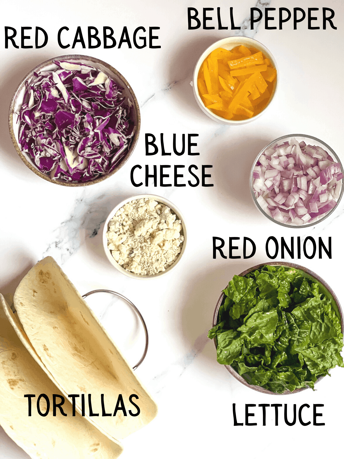 ingredients for buffalo cauliflower tacos on a white background