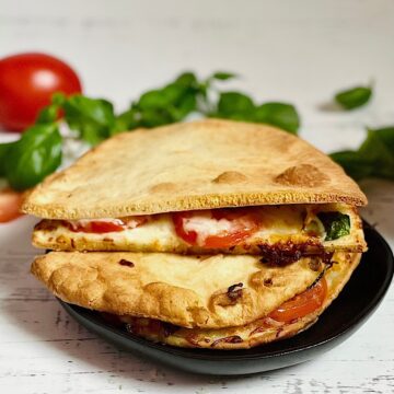 air fryer toasted sandwich with tomatoes, basil and mozzarella cheese