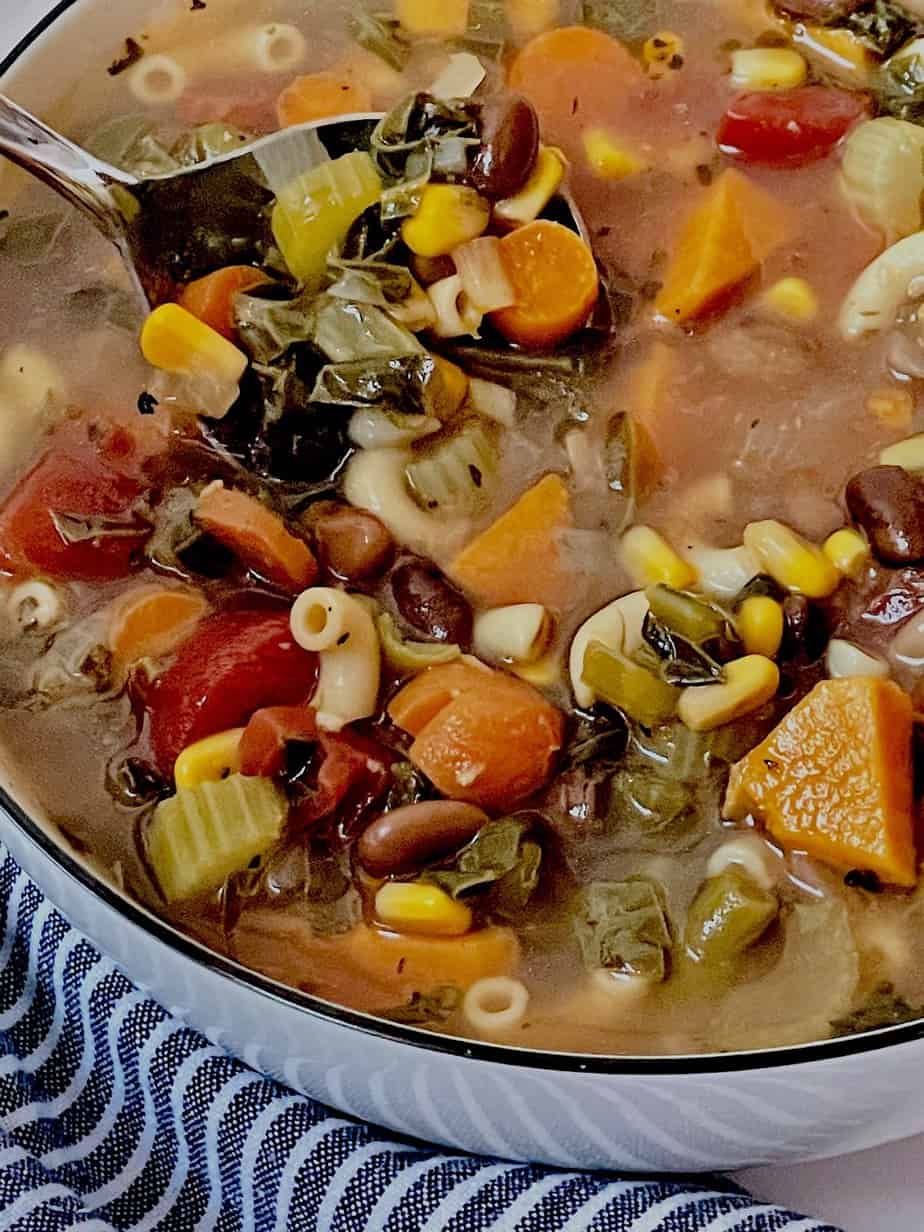 close up of minestrone soup ingredients in a bowl