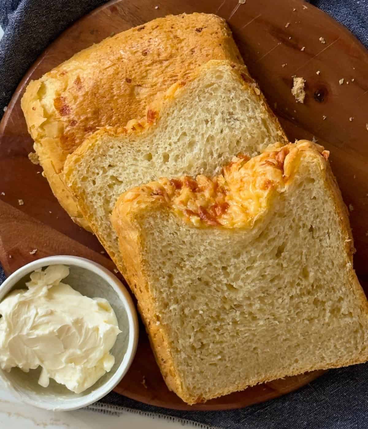 cheese bread slices on a cutting board