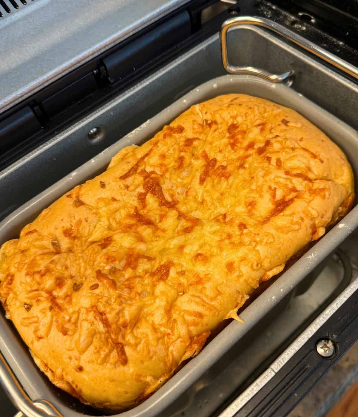 cheese bread in a bread maker pan