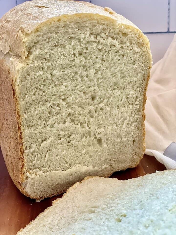 close up of sliced loaf of fluffy white bread machine bread