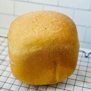 bread machine white bread on a cooling rack