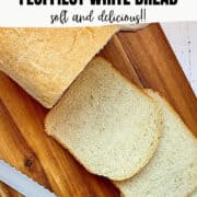 bread machine white bread sliced on a cutting board