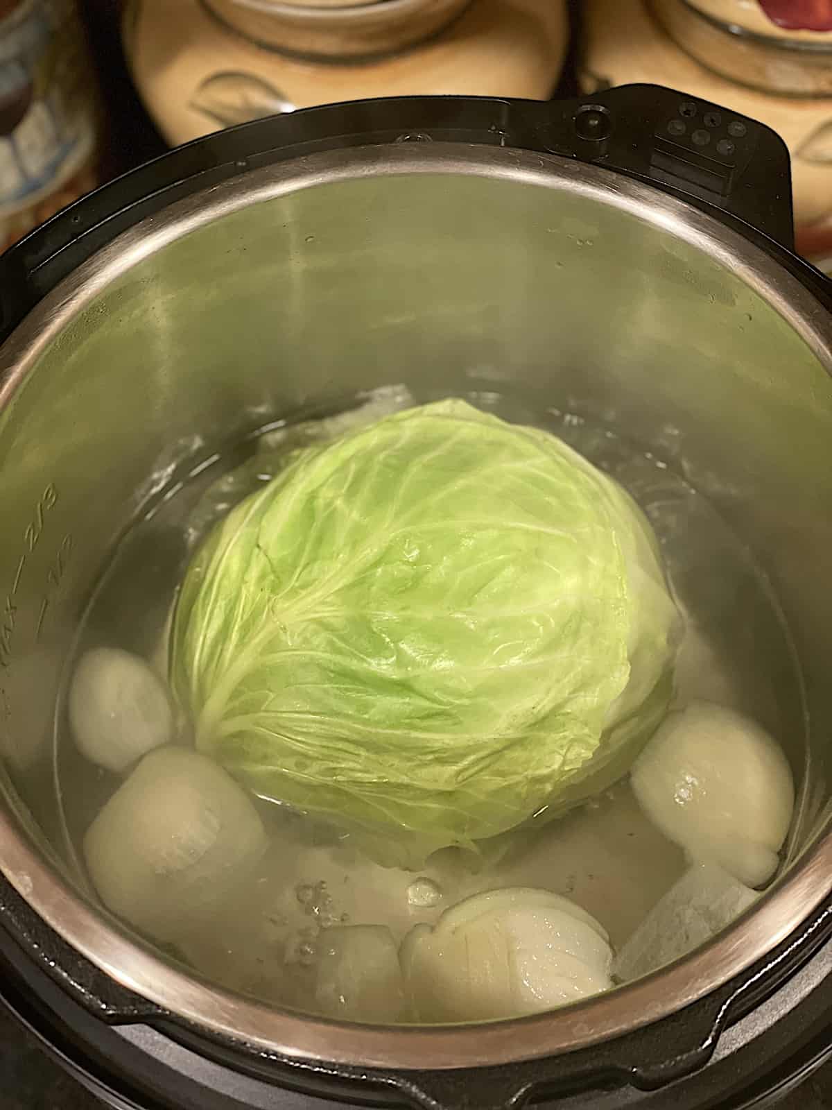 cabbage parboiling with an onion