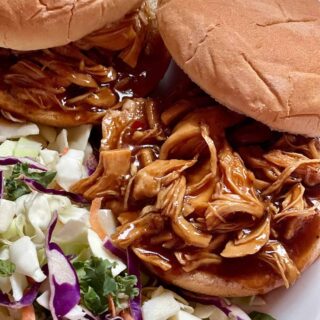 instant pot barbecue chicken on a bun with coleslaw