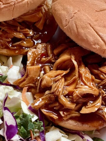 instant pot barbecue chicken on a bun with coleslaw